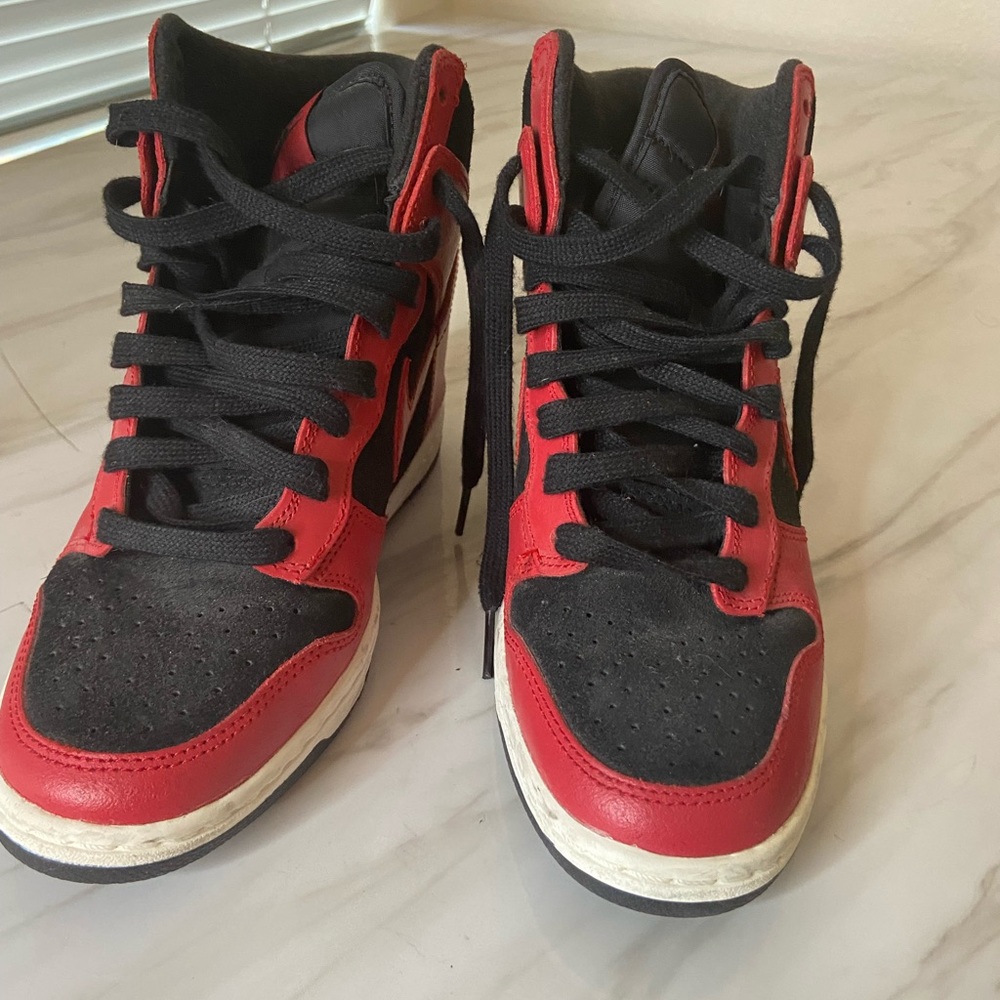 Beautiful Women’s Nike platform high top shoes! Worn only a couple times!